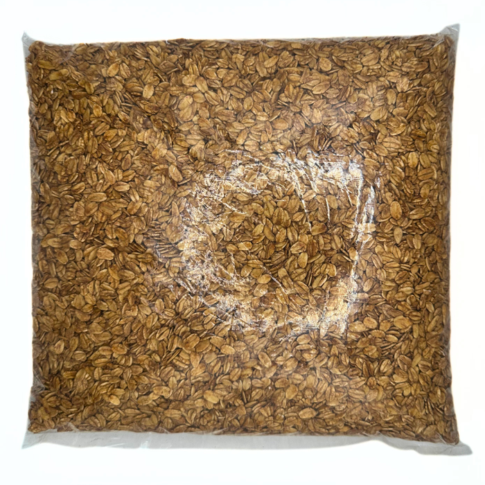 Avena tostada endulzada con miel para uso como cereal de desayuno, topping, ingrediente de galletas y cubierta de helados